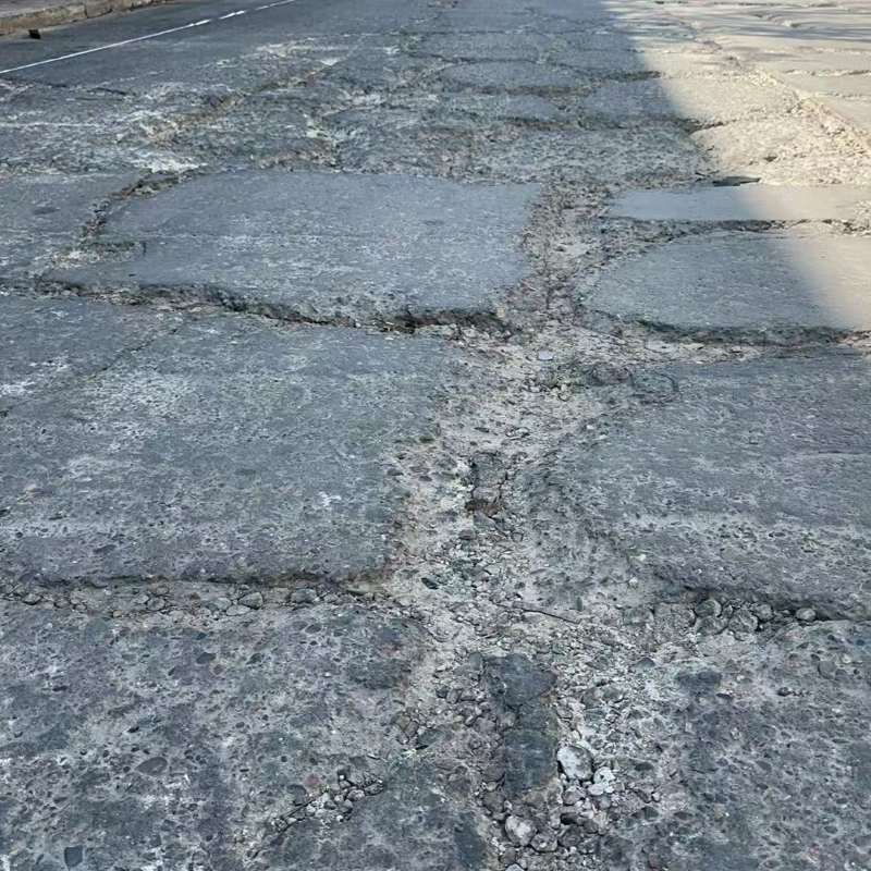 交城路面起砂露石子修补料
